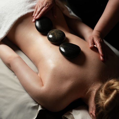 HOT STONE MASSAGE WITH WARM LAVA (VOLCANIC) STONES AND HANDS